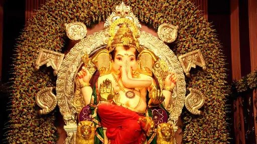 GSB Seva Mandal Mumbai Richest Ganpati Bappa adorned 69 kg gold 336 kg silver
