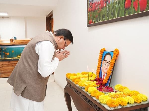 CM Dhami pays floral tribute to Dr BR Ambedkar at his residence