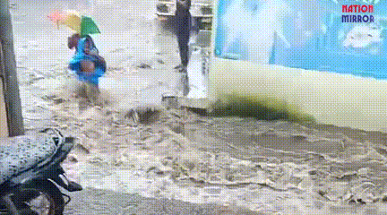 MP rain children swept away video: