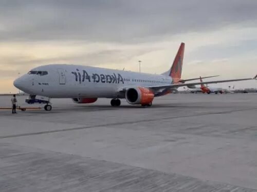 passenger opens emergency door cover akasa flight delayed varanasi airport  