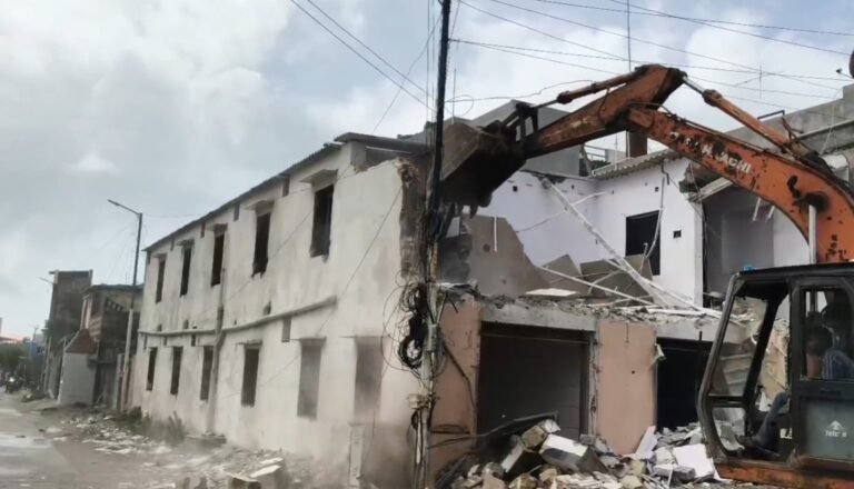 Dwarka bulldozer action