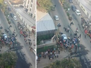 बिल्डिंग से बाहर निकले लोग