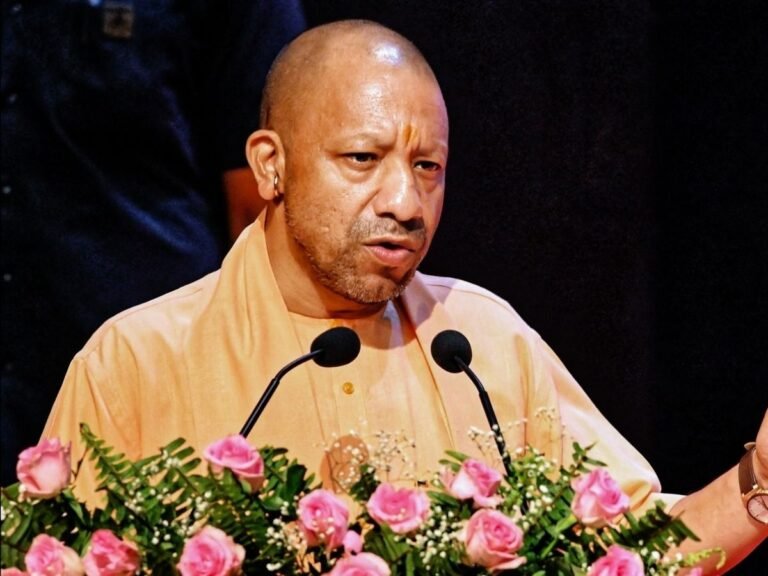 CM Yogi on smartphone